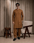 Men's brown unstitched suiting fabric set for formal and festive wear, featuring a kurta and shalwar