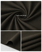 Dark olive Wash and Wear suiting fabric with smooth texture, ideal for formal and business wear.