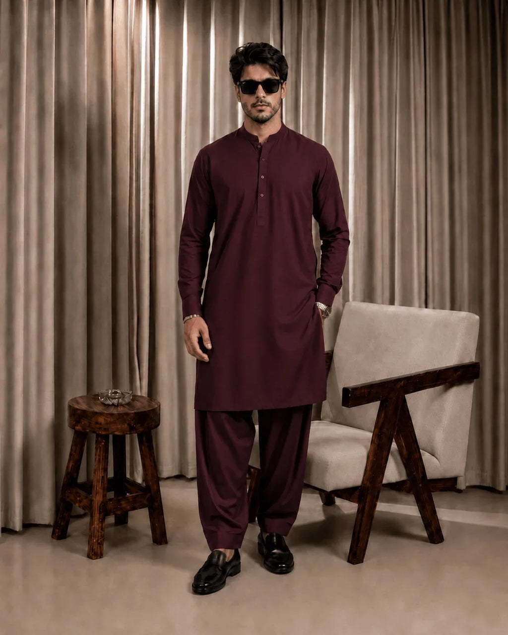 Man in maroon unstitched suiting fabric outfit, formal wear for festive occasions