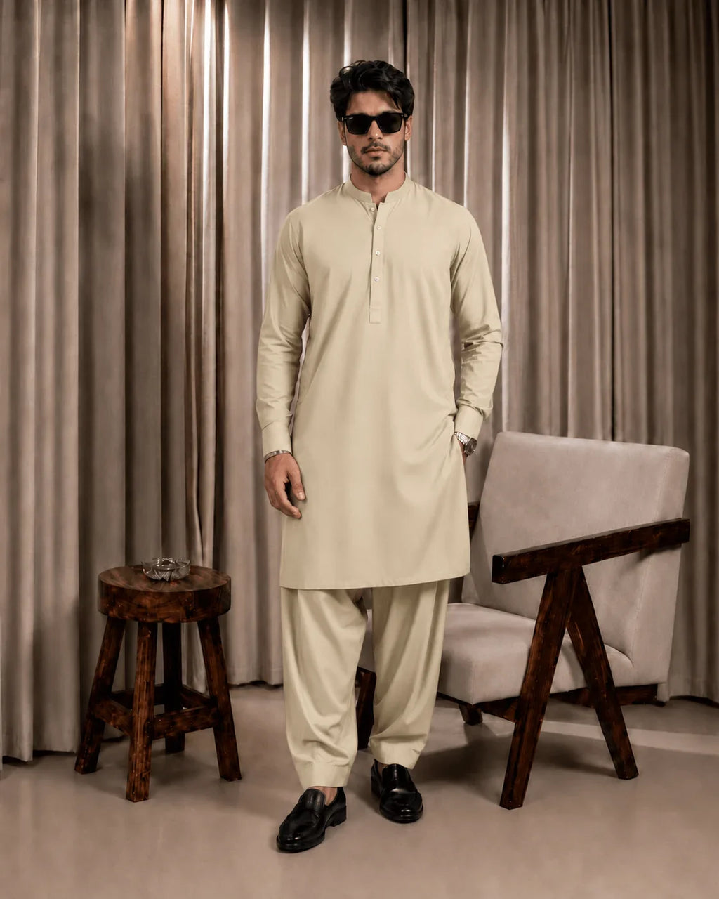 Beige men's shalwar kameez in premium suiting fabric, ideal for formal and festive occasions