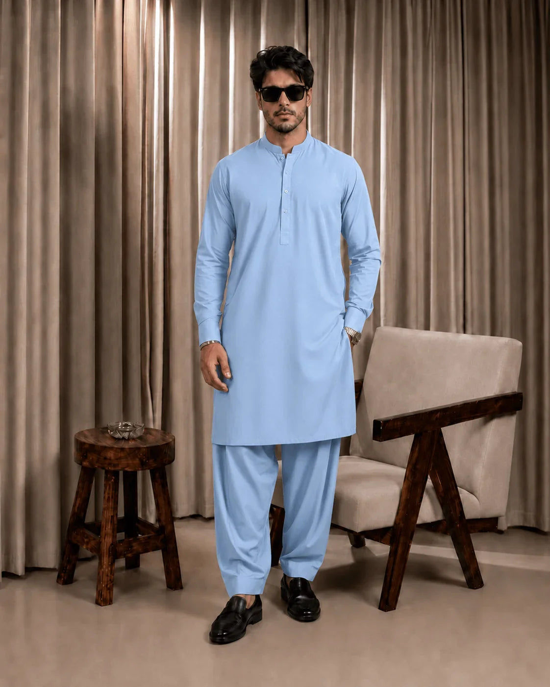 Light blue men's shalwar kameez in premium suiting fabric, ideal for formal and festive occasions