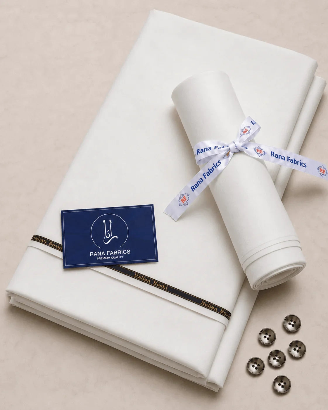 Premium Italian Boski men's suiting fabric, neatly folded with branded ribbon and buttons for formal wear.