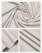 Cream wash and wear suiting fabric with smooth texture and neat stitching for men's formal wear